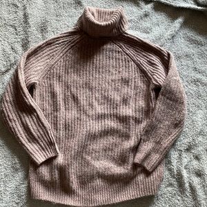 Cozy turtleneck tunic length sweater